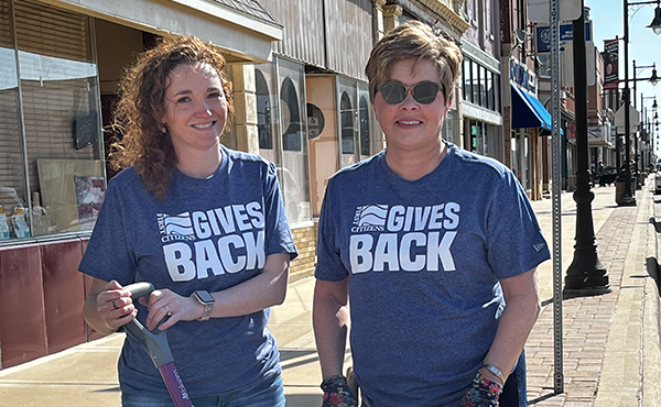 New Hampton staff Jill and Patty helped the chamber water flowers downtown