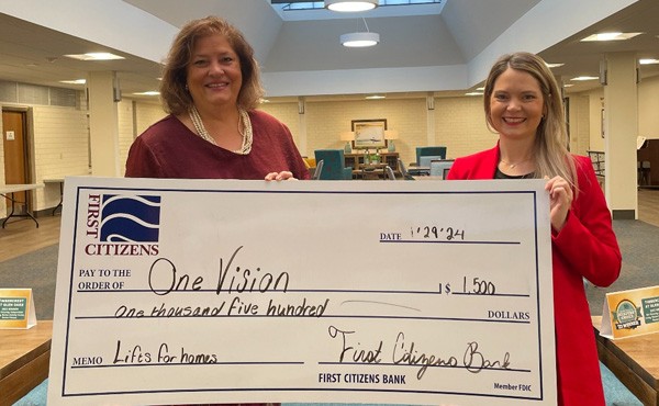 $1,500 donation to One Vision for lifts for homes 