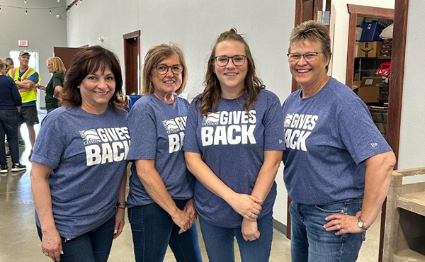 Mercedes, Kim, Brittany, and Jill volunteered at the Charles City Mobile Pantry