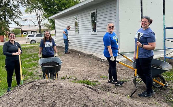 MCW staff Bridget, Nyah, Courtney, and Heidi volunteered with Habitat for Humanity