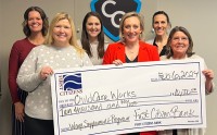 $10,000 donation to Child Care Works towards their wage supplement program. Pictured is FCB employee Julie B with Bridgette D, Jenna H, Colleen F, Kelli G, and Kathy L.